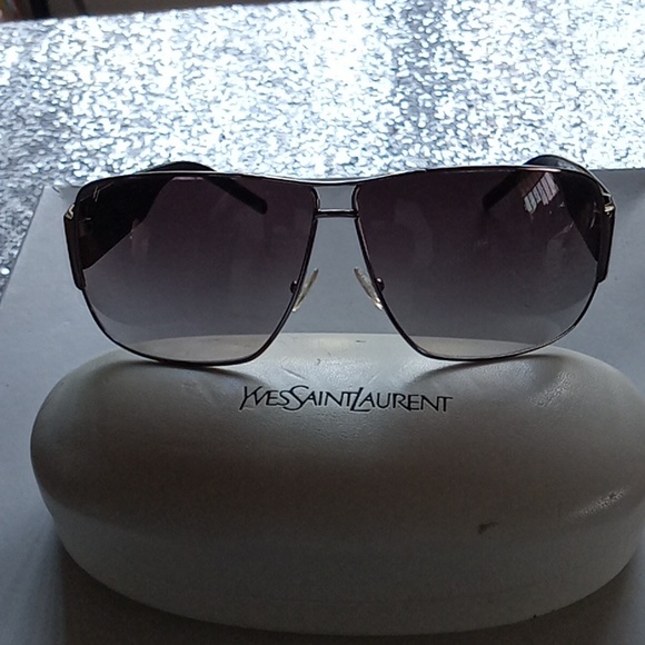 YvesSaintLaurent shades very min scratch in case with original wipe cleaner